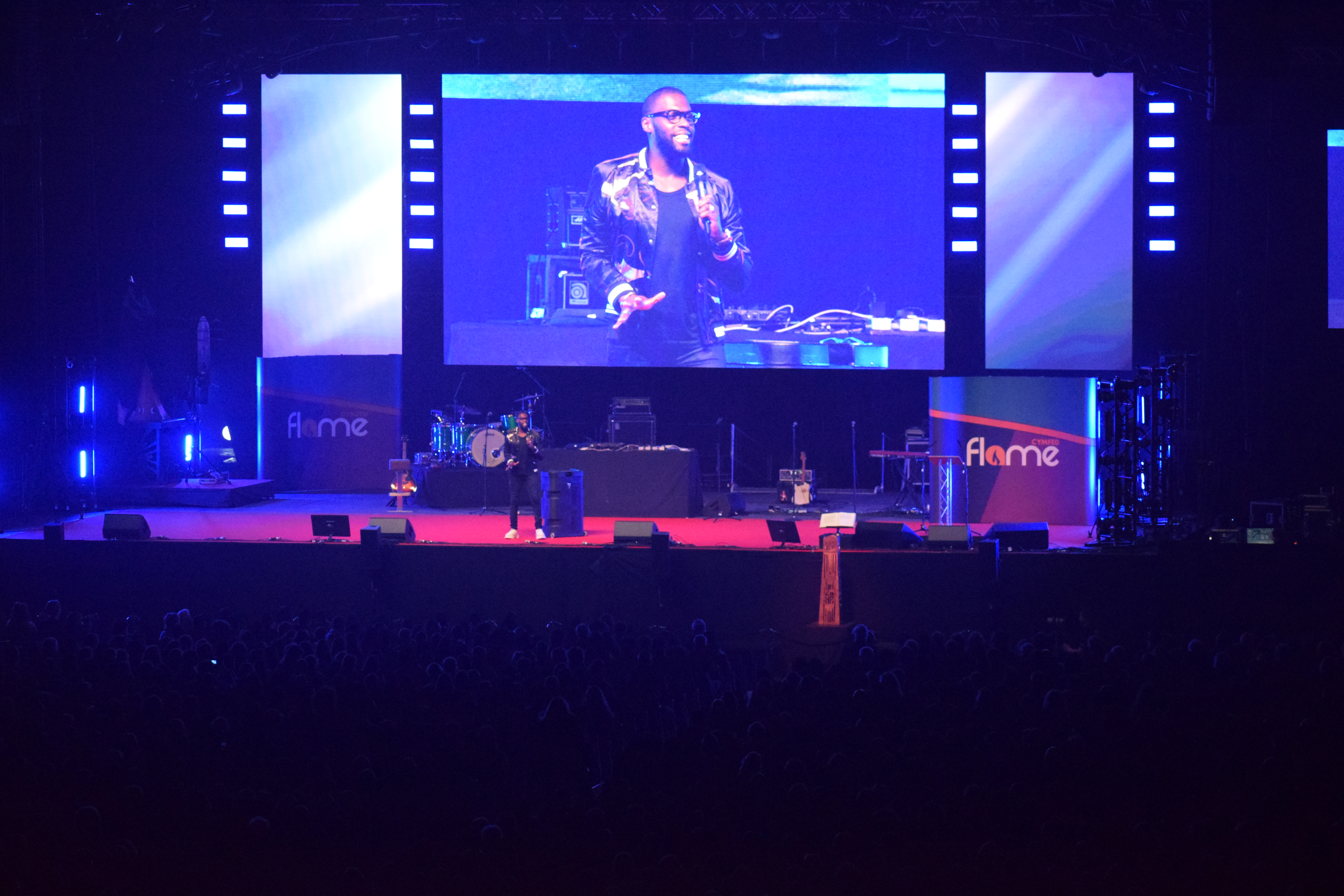 Robert Madu giving an inspiring and funny talk at Flame 2019 (Photo: WYM)